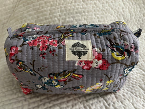Lined Toiletry Bag in Birds of a Feather (blue)